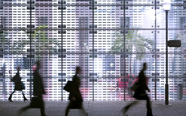 Business people walking inside a building