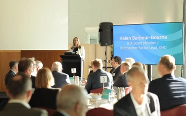 Helen Barbour-Bourne presenting at the International Hydropower Association event.