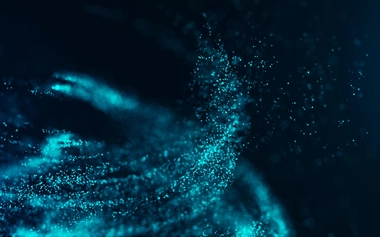 Abstract blue digital particles forming flowing data waves on a dark background.