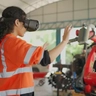 an engineer controls a machine using VR technology