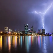 AdobeStock_192285816_City_with_multiple_lightning_strikes